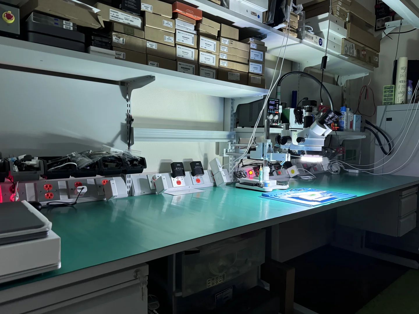 WarriorMac repair workbench with microscope and micro-soldering equipment in Tampa