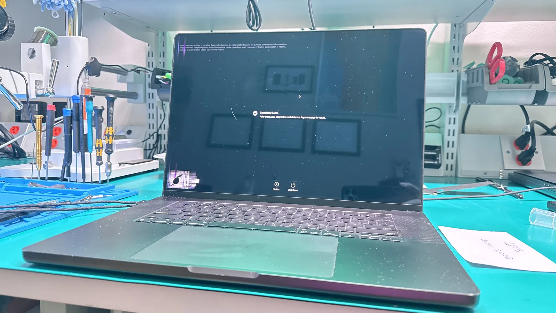 MacBook screen diagnostics completed on WarriorMac workbench