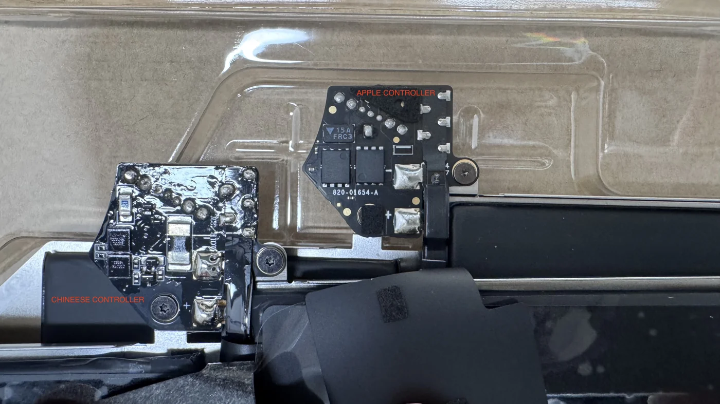 Genuine Apple battery controller board 820-01654-A next to a counterfeit Chinese clone controller on the WarriorMac repair bench